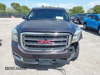 2016 GMC Yukon SLT with VIN 1GKS2BKC2GR277460, listed as a IAAI auction lot 42027026 with 111,191 mi miles. Bid and sale history available at carsss.com. Image 6.