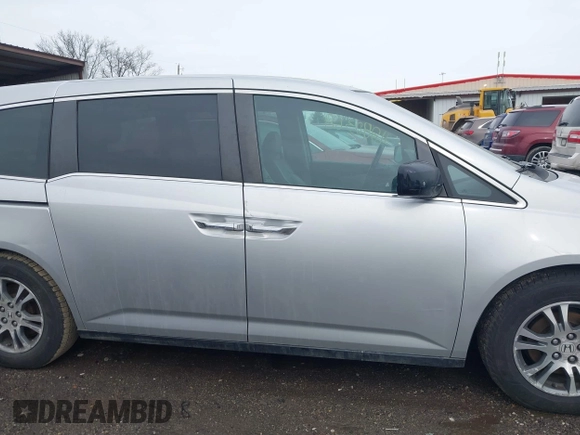 2013 Honda Odyssey EX-L with VIN 5FNRL5H63DB007682, listed as a IAAI auction lot 41408103 with 201,453 mi miles and . Bid and sale history available at carsss.com. Image 13.