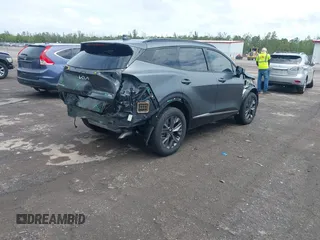 2023 Kia Sportage SX-Prestige with VIN KNDPXCAG7P7071365, listed as a IAAI auction lot 42247639 with 21,509 mi miles and . Bid and sale history available at DreamBid. Image 4.