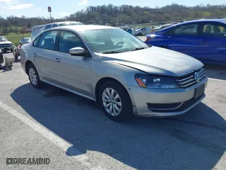 2014 Volkswagen Passat Wolfsburg Ed with VIN 1VWAS7A38EC107879, listed as a IAAI auction lot 41854042 with 131,830 mi miles. Bid and sale history available at carsss.com. Image 1.