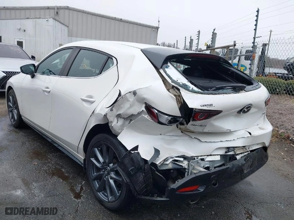 2019 Mazda Mazda3 Hatchback with VIN JM1BPAJM3K1135627, listed as a IAAI auction lot 41561810 with 30,558 mi miles. Bid and sale history available at carsss.com. Image 3.