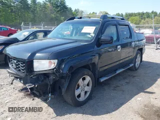 2010 Honda Ridgeline RTL z VIN 5FPYK1F56AB003730, wystawiony jako IAAI lot #42255351 z przebiegiem 190 630 mil mil oraz . Historia ofert i sprzedaży dostępna na DreamBid. Obrazek 17.