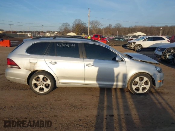 2012 Volkswagen Jetta SportWagen TDI w/Sunroof with VIN 3VWPL7AJ0CM700623, listed as a IAAI auction lot 41758049 with 126,199 mi miles. Bid and sale history available at carsss.com. Image 13.