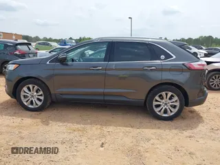 2020 Ford Edge Titanium z VIN 2FMPK4K98LBA76737, wystawiony jako IAAI lot #41981689 z przebiegiem 93 501 mil mil oraz . Historia ofert i sprzedaży dostępna na DreamBid. Obrazek 14.
