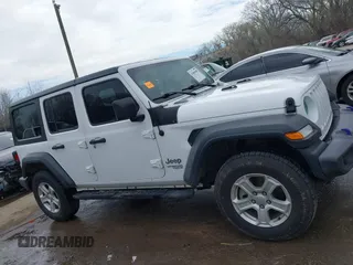 2018 Jeep Wrangler Unlimited Sport z VIN 1C4HJXDN3JW142453, wystawiony jako IAAI lot #41889589 z przebiegiem 53 693 mil mil oraz . Historia ofert i sprzedaży dostępna na DreamBid. Obrazek 13.