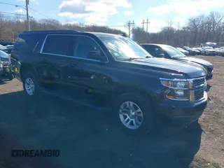 2017 Chevrolet Suburban LT with VIN 1GNSKHKC1HR159584, listed as a IAAI auction lot 41687741 with 197,294 mi miles. Bid and sale history available at carsss.com. Image 1.
