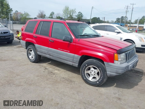 1996 Jeep Grand Cherokee Laredo with VIN 1J4FX58S4TC346218, listed as a IAAI auction lot 41943268 with 138,431 mi miles and . Bid and sale history available at DreamBid. Image 1.