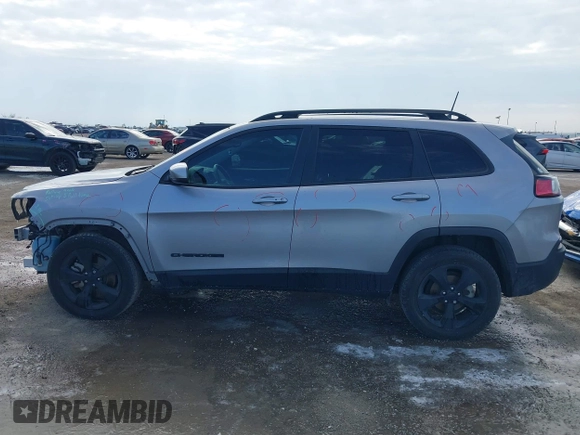 2021 Jeep Cherokee Altitude with VIN 1C4PJLLB6MD112830, listed as a IAAI auction lot 41560135 with 76,760 mi miles. Bid and sale history available at carsss.com. Image 15.