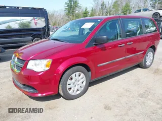 2014 Dodge Grand Caravan American Value with VIN 2C4RDGBG4ER366328, listed as a IAAI auction lot 42127426 with 69,358 mi miles and . Bid and sale history available at DreamBid. Image 2.
