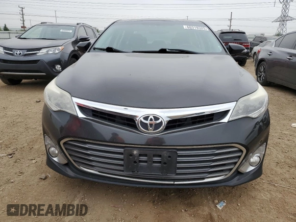 2014 Toyota Avalon Limited z VIN 4T1BK1EB0EU093391, wystawiony jako Copart lot #60319325 z przebiegiem 231 666 mil mil oraz Czysty tytuł • Clean title. Historia ofert i sprzedaży dostępna na DreamBid. Obrazek 5.