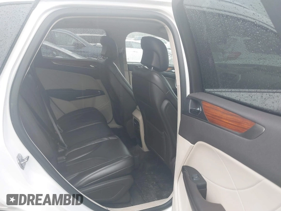 2018 Lincoln MKC Select with VIN 5LMCJ2D95JUL08427, listed as a IAAI auction lot 41836124 with 36,882 mi miles and . Bid and sale history available at DreamBid. Image 8.