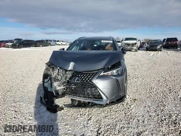 2021 Lexus UX 250h z VIN JTHX9JBH8M2047296, wystawiony jako Copart lot #87916535 z przebiegiem 10 297 mil mil oraz Szkoda całkowita • Salvage title. Historia ofert i sprzedaży dostępna na DreamBid. Obrazek 10.
