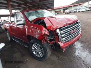 2015 GMC Canyon 2WD SLT with VIN 1GTG5CE39F1225427, listed as a IAAI auction lot 41453753 with 115,801 mi miles. Bid and sale history available at carsss.com. Image 1.