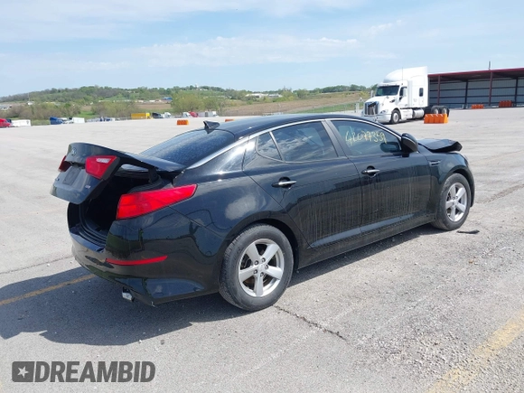 2015 Kia Optima LX with VIN 5XXGM4A79FG394563, listed as a IAAI auction lot 42077359 with 115,124 mi miles and . Bid and sale history available at DreamBid. Image 4.