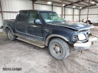 2001 Ford F-150 SuperCrew XLT with VIN 1FTRW07L31KB49885, listed as a IAAI auction lot 41547265 with NaN miles. Bid and sale history available at carsss.com. Image 1.