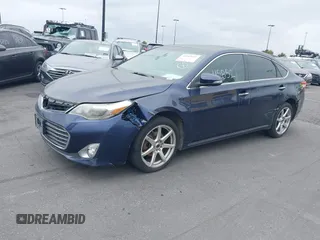 2013 Toyota Avalon XLE with VIN 4T1BK1EBXDU028403, listed as a IAAI auction lot 41545852 with 147,668 mi miles and . Bid and sale history available at DreamBid. Image 2.