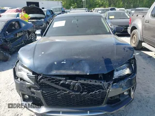 2012 Audi A7 Prestige with VIN WAUSGAFC0CN008552, listed as a IAAI auction lot 42068614 with 107,400 mi miles and . Bid and sale history available at DreamBid. Image 12.