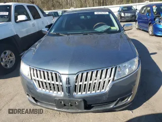2011 Lincoln MKZ Hybrid z VIN 3LNDL2L3XBR775589, wystawiony jako Copart lot #50796705 z przebiegiem 84 973 mil mil oraz Szkoda całkowita • Salvage title. Historia ofert i sprzedaży dostępna na DreamBid. Obrazek 5.