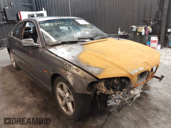 2001 BMW 3 Series 325Ci with VIN WBABN33471JW48292, listed as a IAAI auction lot 41557412 with 118,000 mi miles. Bid and sale history available at carsss.com. Image 1.