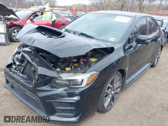 2020 Subaru WRX STI z VIN JF1VA2E6XL9818207, wystawiony jako IAAI lot #41929778 z przebiegiem 33 363 mil mil oraz . Historia ofert i sprzedaży dostępna na DreamBid. Obrazek 17.