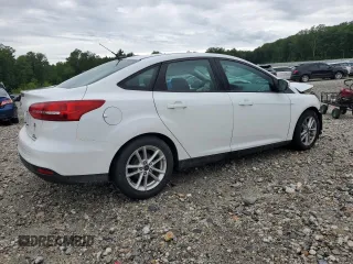 2015 Ford Focus SE with VIN 1FADP3F24FL282695, listed as a Copart auction lot 64051245 with 142,039 mi miles and Clean title. Bid and sale history available at DreamBid. Image 3.