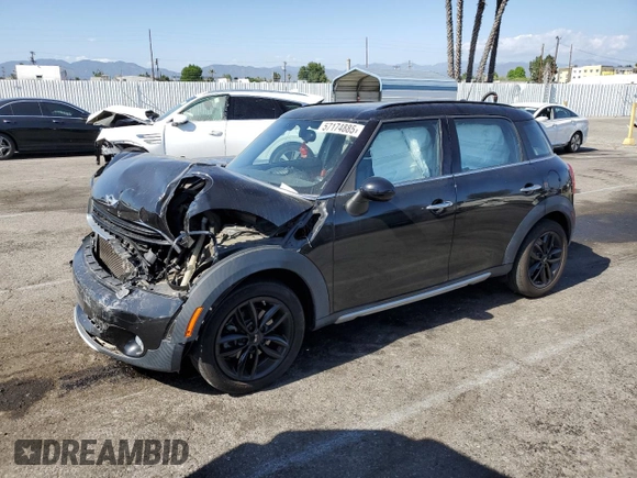 2016 MINI Countryman with VIN WMWZB3C58GWR47074, listed as a Copart auction lot 57174885 with 83,062 mi miles and Salvage title. Bid and sale history available at DreamBid. Image 1.