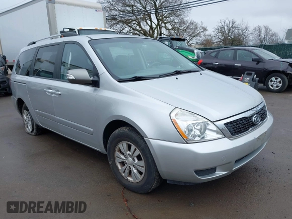 2012 Kia Sedona LX with VIN KNDMG4C72C6485952, listed as a IAAI auction lot 42029147 with 129,296 mi miles. Bid and sale history available at carsss.com. Image 1.