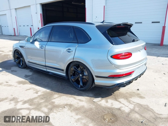 2022 Bentley Bentayga V8 z VIN SJAAM2ZV9NC011752, wystawiony jako IAAI lot #41265000 z przebiegiem Nie podano mil oraz . Historia ofert i sprzedaży dostępna na DreamBid. Obrazek 3.