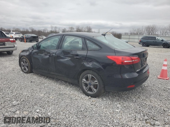2018 Ford Focus SE with VIN 1FADP3FE0JL318465, listed as a Copart auction lot 51136615 with 82,191 mi miles and Salvage Title. Bid and sale history available at carsss.com. Image 2.