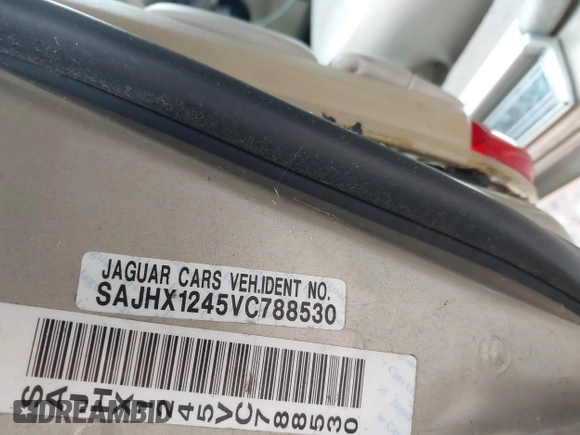 1997 Jaguar XJ with VIN SAJHX1245VC788530, listed as a IAAI auction lot 41768247 with 215,807 mi miles and . Bid and sale history available at DreamBid. Image 9.