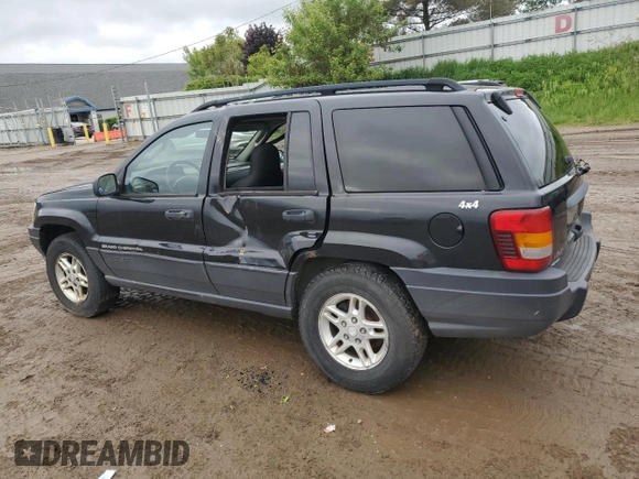 2003 Jeep Grand Cherokee Laredo z VIN 1J4GW48S53C568929, wystawiony jako Copart lot #57604245 z przebiegiem 216 103 mil mil oraz Czysty tytuł • Clean title. Historia ofert i sprzedaży dostępna na DreamBid. Obrazek 2.