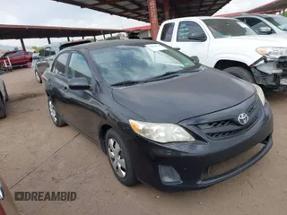 2011 Toyota Corolla L with VIN 2T1BU4EE6BC560462, listed as a IAAI auction lot 42034170 with 199,406 mi miles. Bid and sale history available at carsss.com. Image 1.