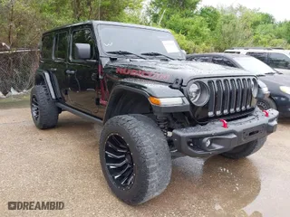 2018 Jeep Wrangler Unlimited Rubicon with VIN 1C4HJXFG5JW265069, listed as a IAAI auction lot 41964668 with 117,292 mi miles. Bid and sale history available at carsss.com. Image 1.