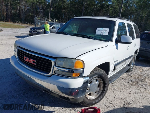 2003 GMC Yukon SLT with VIN 1GKEC13Z83R143232, listed as a IAAI auction lot 41655509 with 148,574 mi miles. Bid and sale history available at carsss.com. Image 2.
