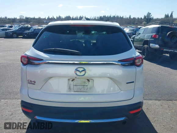 2020 Mazda CX-9 Signature with VIN JM3TCBEY3L0418322, listed as a IAAI auction lot 41723991 with 57,325 mi miles and . Bid and sale history available at carsss.com. Image 16.