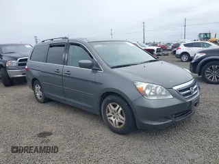2007 Honda Odyssey EX-L z VIN 5FNRL38767B434257, wystawiony jako IAAI lot #42272601 z przebiegiem 129 161 mil mil oraz . Historia ofert i sprzedaży dostępna na DreamBid. Obrazek 1.