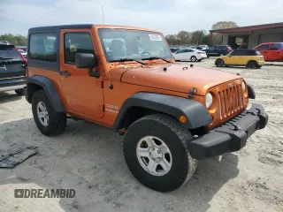 2011 Jeep Wrangler Sport with VIN 1J4AA2D15BL574234, listed as a Copart auction lot 52952605 with 114,642 mi miles and Salvage Title. Bid and sale history available at carsss.com. Image 4.