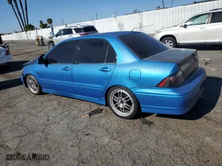 2002 Mitsubishi Lancer OZ-Rally with VIN JA3AJ86E62U070034, listed as a Copart auction lot 86914144 with 180,675 mi miles and Salvage Title. Bid and sale history available at carsss.com. Image 2.