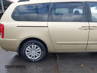 2011 Kia Sedona LX with VIN KNDMG4C71B6407306, listed as a IAAI auction lot 41922697 with 243,248 mi miles. Bid and sale history available at carsss.com. Image 14.
