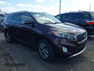 2016 Kia Sorento SX with VIN 5XYPKDA58GG002304, listed as a IAAI auction lot 41990332 with 132,025 mi miles. Bid and sale history available at carsss.com. Image 1.