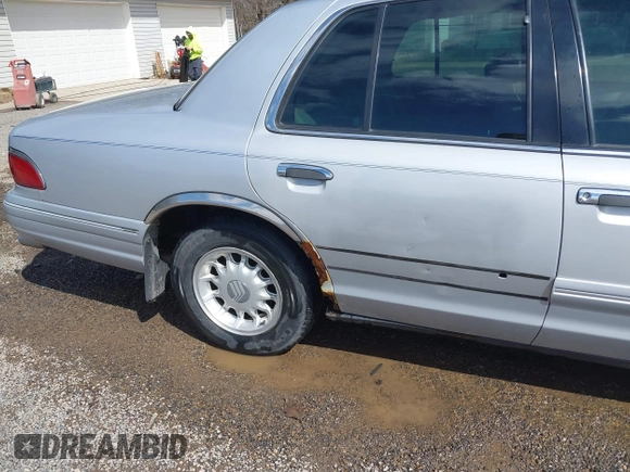 1997 Mercury Grand Marquis LS with VIN 2MELM75W3VX717801, listed as a IAAI auction lot 41920075 with 173,730 mi miles and . Bid and sale history available at DreamBid. Image 19.