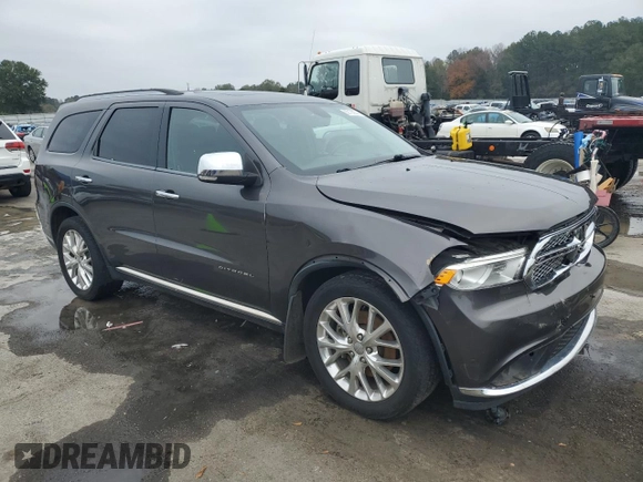 2014 Dodge Durango Citadel with VIN 1C4RDHEG5EC317830, listed as a Copart auction lot 83944054 with 213,837 mi miles and Salvage title. Bid and sale history available at DreamBid. Image 4.
