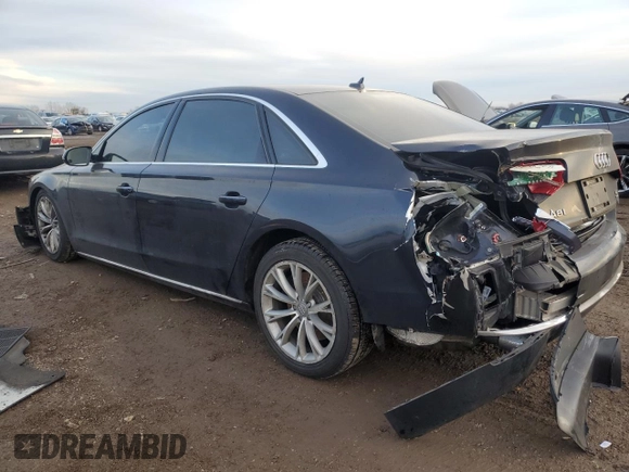 2012 Audi A8 with VIN WAURVAFD0CN025493, listed as a Copart auction lot 86454994 with 142,779 mi miles and Salvage Title. Bid and sale history available at DreamBid. Image 2.