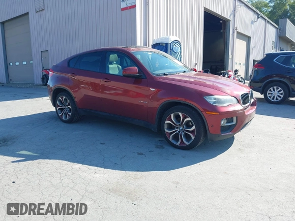 2014 BMW X6 xDrive35i z VIN 5UXFG2C57E0C44052, wystawiony jako IAAI lot #40231766 z przebiegiem 131 573 mil mil oraz . Historia ofert i sprzedaży dostępna na DreamBid. Obrazek 1.