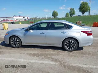 2018 Nissan Altima SR with VIN 1N4AL3APXJC258864, listed as a IAAI auction lot 42018305 with 59,265 mi miles and . Bid and sale history available at carsss.com. Image 14.