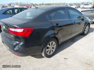 2013 Kia Rio EX with VIN KNADN4A39D6096262, listed as a IAAI auction lot 41094665 with 120,919 mi miles. Bid and sale history available at carsss.com. Image 4.
