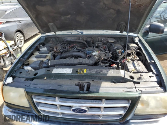 2001 Ford Ranger XL z VIN 1FTYR14V21PB49944, wystawiony jako Copart lot #54184925 z przebiegiem 305 117 mil mil oraz Szkoda całkowita • Salvage title. Historia ofert i sprzedaży dostępna na DreamBid. Obrazek 11.