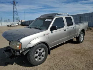 2004 Nissan Frontier SC z VIN 1N6MD29Y14C405117, wystawiony jako Copart lot #73507374 z przebiegiem 284 618 mil mil oraz Szkoda całkowita • Salvage title. Historia ofert i sprzedaży dostępna na DreamBid. Obrazek 1.