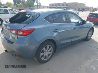 2014 Mazda 3 i Grand Touring with VIN JM1BM1M72E1201071, listed as a IAAI auction lot 42087477 with 127,111 mi miles and . Bid and sale history available at DreamBid. Image 4.