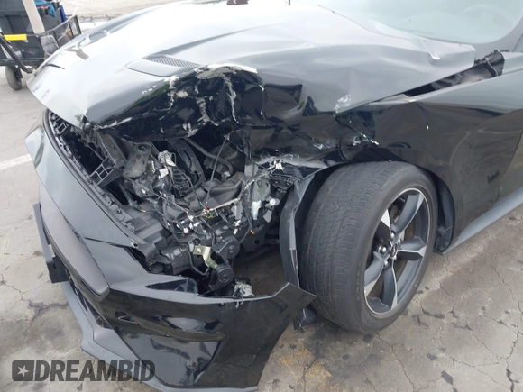 2021 Ford Mustang EcoBoost z VIN 1FA6P8TH7M5115490, wystawiony jako IAAI lot #42428724 z przebiegiem 47 417 mil mil oraz . Historia ofert i sprzedaży dostępna na DreamBid. Obrazek 6.
